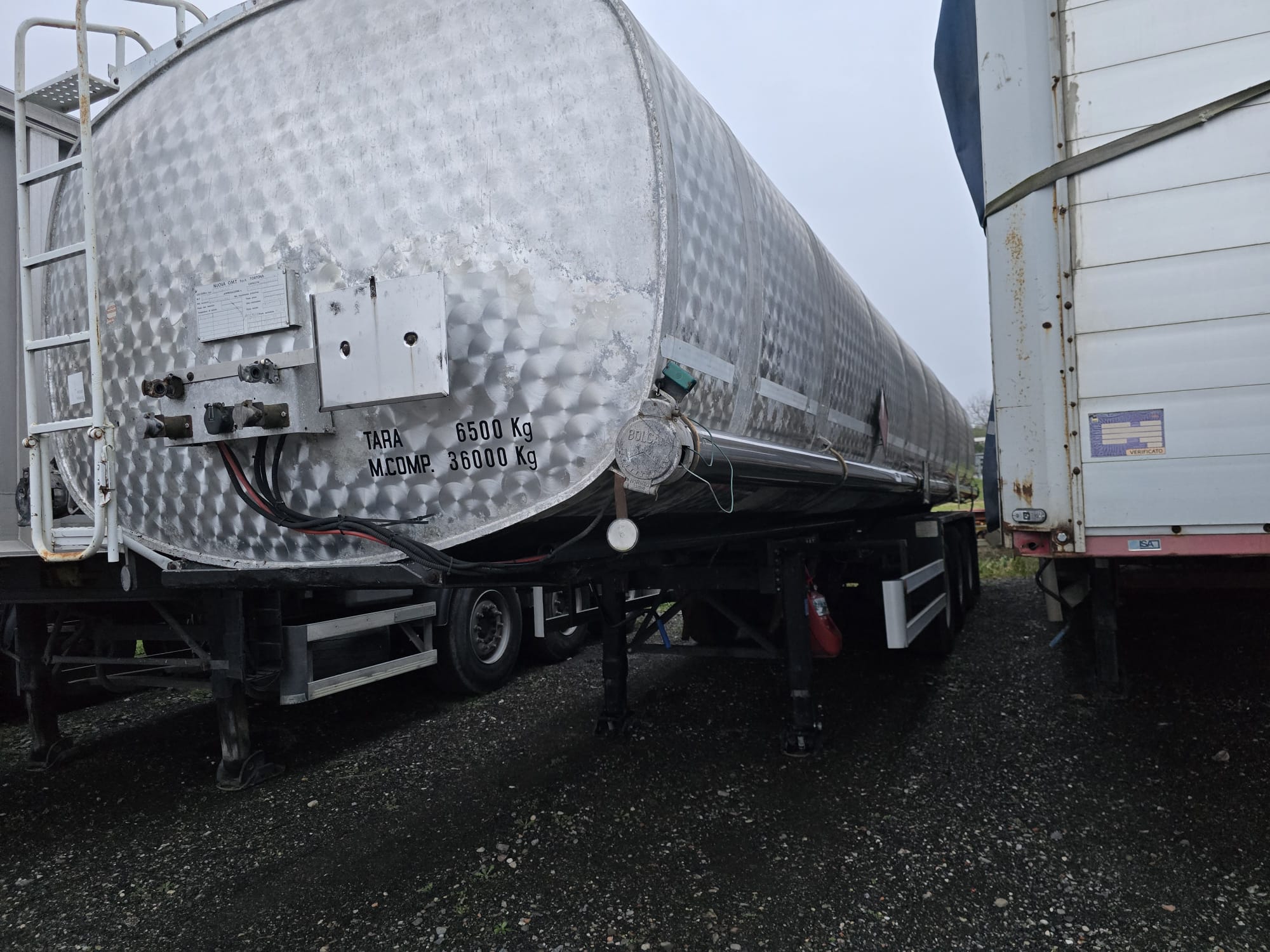 
								SEMIRIMORCHIO OMT completo									